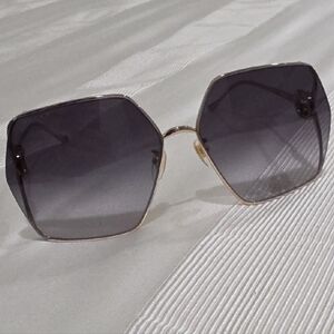 Gucci Gold Frame Sunglasses with Gray Lenses